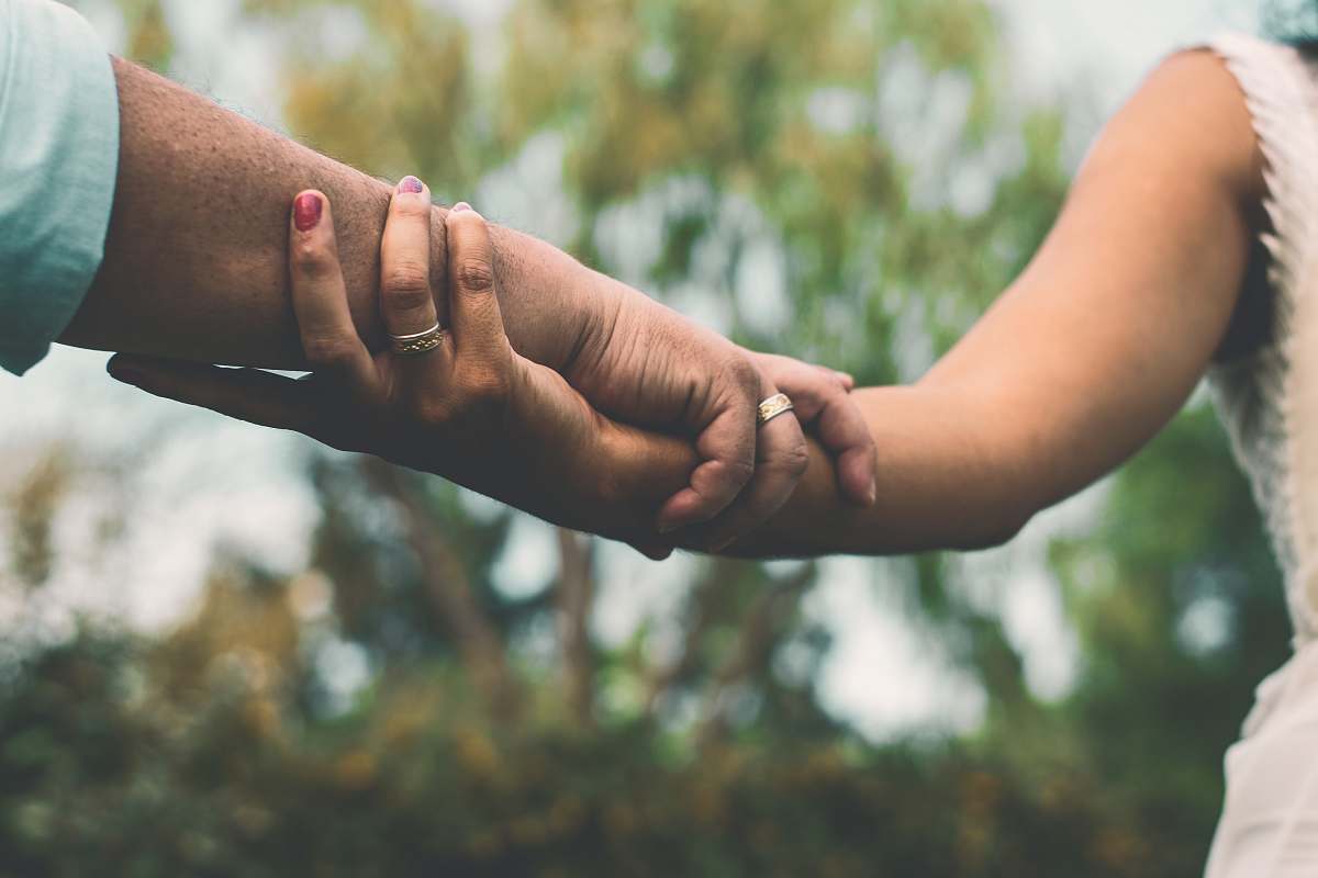 holding hands woman and man holding hands human